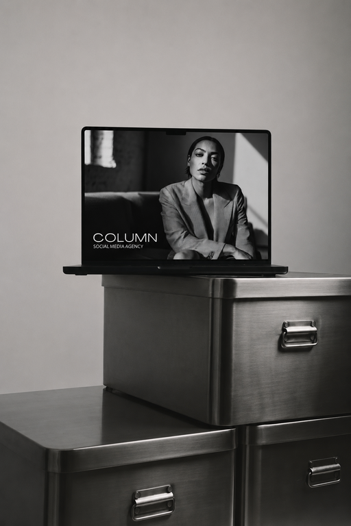 Minimal black and white laptop display showing a website layout for a custom website in one week blog post